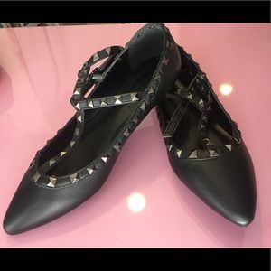 Black stud flats.